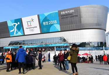 GANGNEUNG, SOUTH KOREA - FEBRUARY 20: Fans enter the arena ahead of Team Switzerland taking on Team Japan during classification round action at the PyeongChang 2018 Olympic Winter Games. (Photo by Matt Zambonin/HHOF-IIHF Images)

